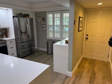 COMPLETELY UPDATED 2-BEDROOM 2 BATH EXQUISITELY DONE, FEATURES on Wynmoor Golf Course in Florida - for sale on GolfHomes.com, golf home, golf lot