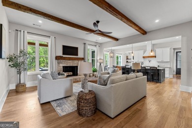 From the moment you arrive, the welcoming charm of the expansive on Coweta Club in Georgia - for sale on GolfHomes.com, golf home, golf lot