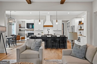 From the moment you arrive, the welcoming charm of the expansive on Coweta Club in Georgia - for sale on GolfHomes.com, golf home, golf lot