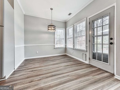 Welcome home to this adorable 3-bedroom, 2-bath ranch located in on Bridgemill Golf Club in Georgia - for sale on GolfHomes.com, golf home, golf lot