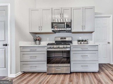 Welcome home to this adorable 3-bedroom, 2-bath ranch located in on Bridgemill Golf Club in Georgia - for sale on GolfHomes.com, golf home, golf lot