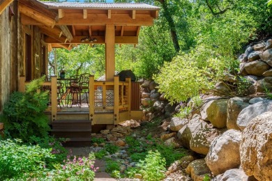 It takes a bit of artistry and a very creative builder to evoke on Rollingstone Ranch Golf Club in Colorado - for sale on GolfHomes.com, golf home, golf lot