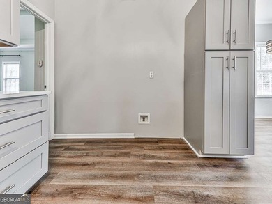 Welcome home to this adorable 3-bedroom, 2-bath ranch located in on Bridgemill Golf Club in Georgia - for sale on GolfHomes.com, golf home, golf lot