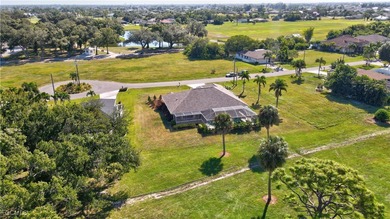 Welcome to your Florida dream home! Tucked away on a quiet on Coral Oaks Golf Course in Florida - for sale on GolfHomes.com, golf home, golf lot