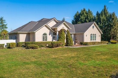 Stunning home on the 4th fairway of Grants Pass Golf Course on  in Oregon - for sale on GolfHomes.com, golf home, golf lot