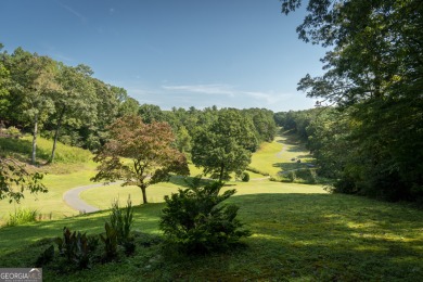 Enjoy a SPECTACULAR golf course view with a few mountains thrown on Innsbruck Resort and Golf Club in Georgia - for sale on GolfHomes.com, golf home, golf lot