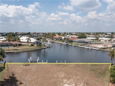 LARGER THAN AVERAGE KEY LOT IN PUNTA GORDA ISLES W/***162FT OF on Saint Andrews South Golf Club in Florida - for sale on GolfHomes.com, golf home, golf lot