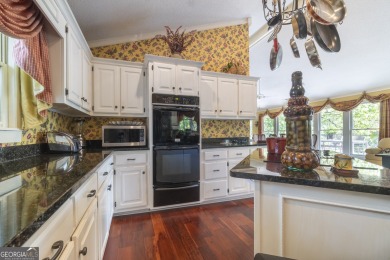 Enjoy a SPECTACULAR golf course view with a few mountains thrown on Innsbruck Resort and Golf Club in Georgia - for sale on GolfHomes.com, golf home, golf lot