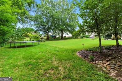 Welcome home to this classic Bradshaw Farm beauty in Hickory on The Golf Club At Bradshaw Farm in Georgia - for sale on GolfHomes.com, golf home, golf lot