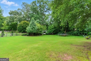 Welcome home to this classic Bradshaw Farm beauty in Hickory on The Golf Club At Bradshaw Farm in Georgia - for sale on GolfHomes.com, golf home, golf lot