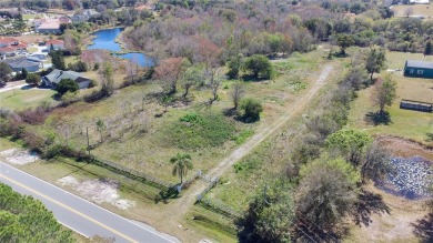 Absolutely breathtaking! That 7.09-acre parcel of land sounds on Kissimmee Bay Country Club in Florida - for sale on GolfHomes.com, golf home, golf lot