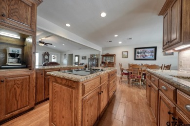 This charming single-family home offers 2,013 sq ft of living on Hide-A-Way Lake Golf Course in Texas - for sale on GolfHomes.com, golf home, golf lot