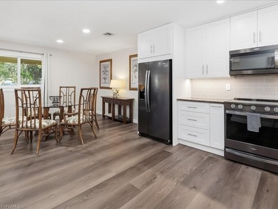 Beautiful Glades Golf & Country Club villa with SW exposure lake on The Glades Golf and Country Club in Florida - for sale on GolfHomes.com, golf home, golf lot