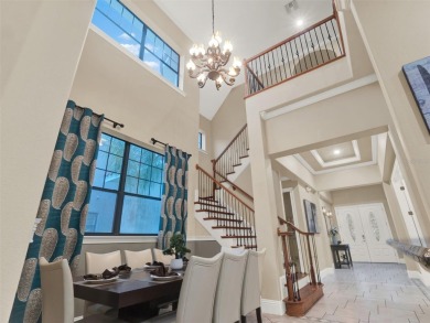 Stunning 6-Bedroom Luxury Home in Reunion Resort - Golf Course on ChampionsGate Golf Resort in Florida - for sale on GolfHomes.com, golf home, golf lot