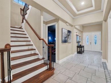 Stunning 6-Bedroom Luxury Home in Reunion Resort - Golf Course on ChampionsGate Golf Resort in Florida - for sale on GolfHomes.com, golf home, golf lot