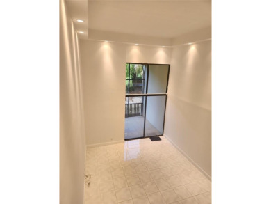 Experience the exceptional charm of this remodeled 3-bedroom on  in Florida - for sale on GolfHomes.com, golf home, golf lot