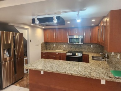 Experience the exceptional charm of this remodeled 3-bedroom on  in Florida - for sale on GolfHomes.com, golf home, golf lot
