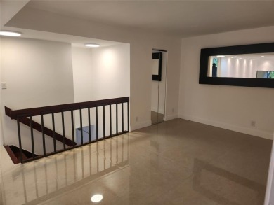 Experience the exceptional charm of this remodeled 3-bedroom on  in Florida - for sale on GolfHomes.com, golf home, golf lot