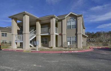 Experience the best of lake living and city convenience in this on Pointe Royale Village Country Club in Missouri - for sale on GolfHomes.com, golf home, golf lot