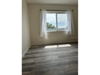 Two bedroom, one bathroom condo on second floorpletely remodeled on Clearwater Executive Golf Course in Florida - for sale on GolfHomes.com, golf home, golf lot