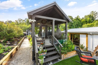 This tiny home may be small in size, but it's big on charm and on Laurel Valley Golf Course in Tennessee - for sale on GolfHomes.com, golf home, golf lot
