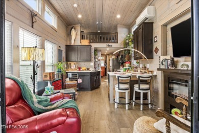 This tiny home may be small in size, but it's big on charm and on Laurel Valley Golf Course in Tennessee - for sale on GolfHomes.com, golf home, golf lot