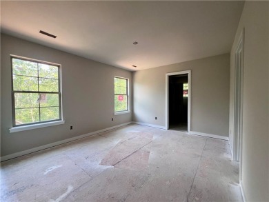 Must see new construction centrally located between Lake Ann and on Bella Vista - Metfield Golf Complex and Country Club in Arkansas - for sale on GolfHomes.com, golf home, golf lot