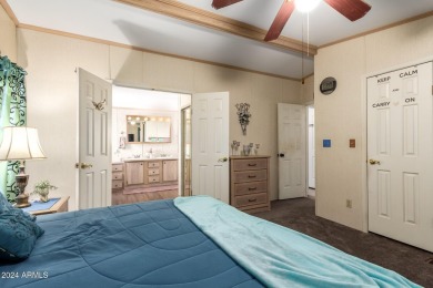 This meticulously maintained corner-lot manufactured home offers on Apache Creek Golf Club in Arizona - for sale on GolfHomes.com, golf home, golf lot