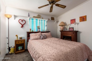 This meticulously maintained corner-lot manufactured home offers on Apache Creek Golf Club in Arizona - for sale on GolfHomes.com, golf home, golf lot