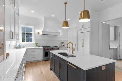 Discover exceptional craftsmanship and timeless design in this on Members Club At St. James Plantation in North Carolina - for sale on GolfHomes.com, golf home, golf lot