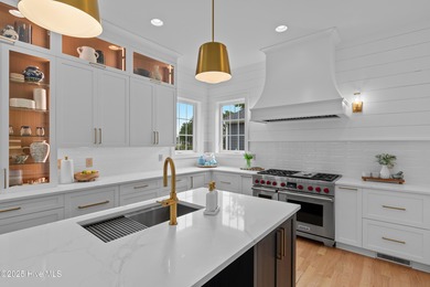 Discover exceptional craftsmanship and timeless design in this on Members Club At St. James Plantation in North Carolina - for sale on GolfHomes.com, golf home, golf lot