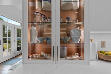 Discover exceptional craftsmanship and timeless design in this on Members Club At St. James Plantation in North Carolina - for sale on GolfHomes.com, golf home, golf lot