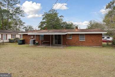 Welcome to this beautifully maintained MOVE-IN READY gem just on Bacon Park Golf Course in Georgia - for sale on GolfHomes.com, golf home, golf lot