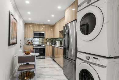 Experience coastal living at its finest in this fully updated on Palm Beach Par-3 Golf Course in Florida - for sale on GolfHomes.com, golf home, golf lot