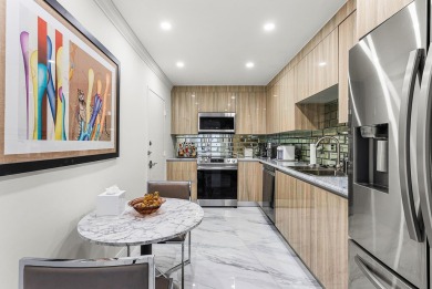 Experience coastal living at its finest in this fully updated on Palm Beach Par-3 Golf Course in Florida - for sale on GolfHomes.com, golf home, golf lot