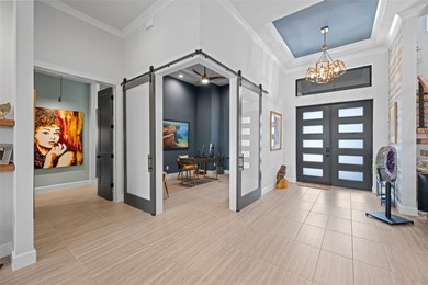 Welcome to refined coastal living in this extraordinary on The Ocean Course At Hammock Beach Resort in Florida - for sale on GolfHomes.com, golf home, golf lot