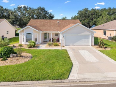 Welcome home to this enhanced Cypress (Vera Cruz) model on El Diablo Executive Golf Course in Florida - for sale on GolfHomes.com, golf home, golf lot