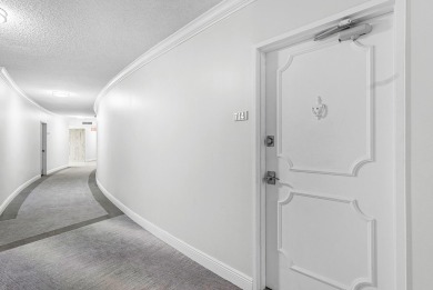 Experience coastal living at its finest in this fully updated on Palm Beach Par-3 Golf Course in Florida - for sale on GolfHomes.com, golf home, golf lot