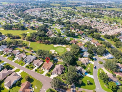 Welcome home to this enhanced Cypress (Vera Cruz) model on El Diablo Executive Golf Course in Florida - for sale on GolfHomes.com, golf home, golf lot