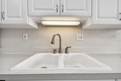 JUST REDUCED! Second floor 2/2 condo located in the highly on Cove Cay Country Club in Florida - for sale on GolfHomes.com, golf home, golf lot