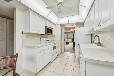 JUST REDUCED! Second floor 2/2 condo located in the highly on Cove Cay Country Club in Florida - for sale on GolfHomes.com, golf home, golf lot