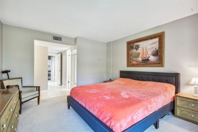 JUST REDUCED! Second floor 2/2 condo located in the highly on Cove Cay Country Club in Florida - for sale on GolfHomes.com, golf home, golf lot