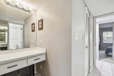 JUST REDUCED! Second floor 2/2 condo located in the highly on Cove Cay Country Club in Florida - for sale on GolfHomes.com, golf home, golf lot