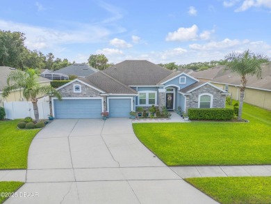 Stunning 4BR/3BA Home with Office  Whole-House Generator in on Sugar Mill Country Club in Florida - for sale on GolfHomes.com, golf home, golf lot