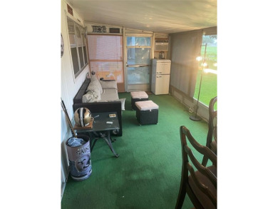 Absolutely beautiful 2/2 double wide on one of the best views of on Davie Golf Club in Florida - for sale on GolfHomes.com, golf home, golf lot