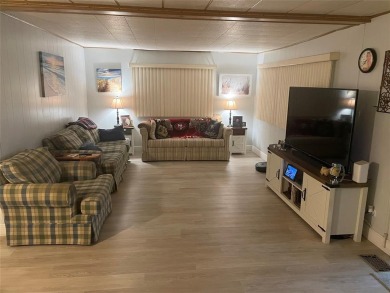 Absolutely beautiful 2/2 double wide on one of the best views of on Davie Golf Club in Florida - for sale on GolfHomes.com, golf home, golf lot