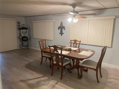 Absolutely beautiful 2/2 double wide on one of the best views of on Davie Golf Club in Florida - for sale on GolfHomes.com, golf home, golf lot