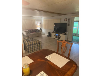 Absolutely beautiful 2/2 double wide on one of the best views of on Davie Golf Club in Florida - for sale on GolfHomes.com, golf home, golf lot