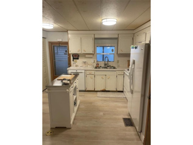 Absolutely beautiful 2/2 double wide on one of the best views of on Davie Golf Club in Florida - for sale on GolfHomes.com, golf home, golf lot