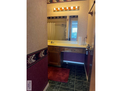 This 2- bedroom, 2-Bath home offers incredible potential in a on River Bend Country Club in Texas - for sale on GolfHomes.com, golf home, golf lot